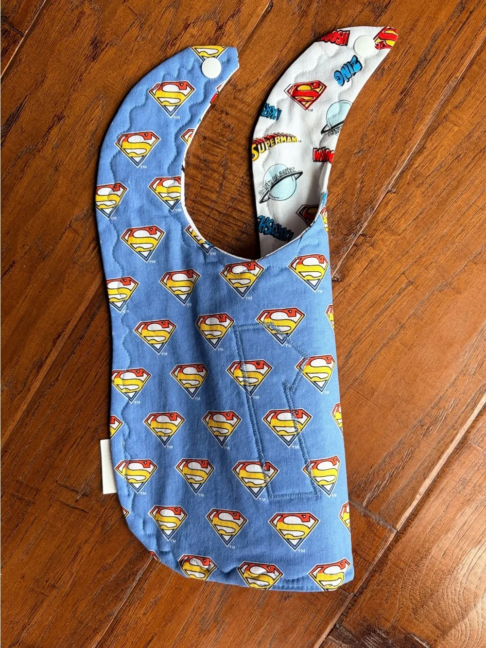 DC Comics Superman White Bib with Blue and Red Accents